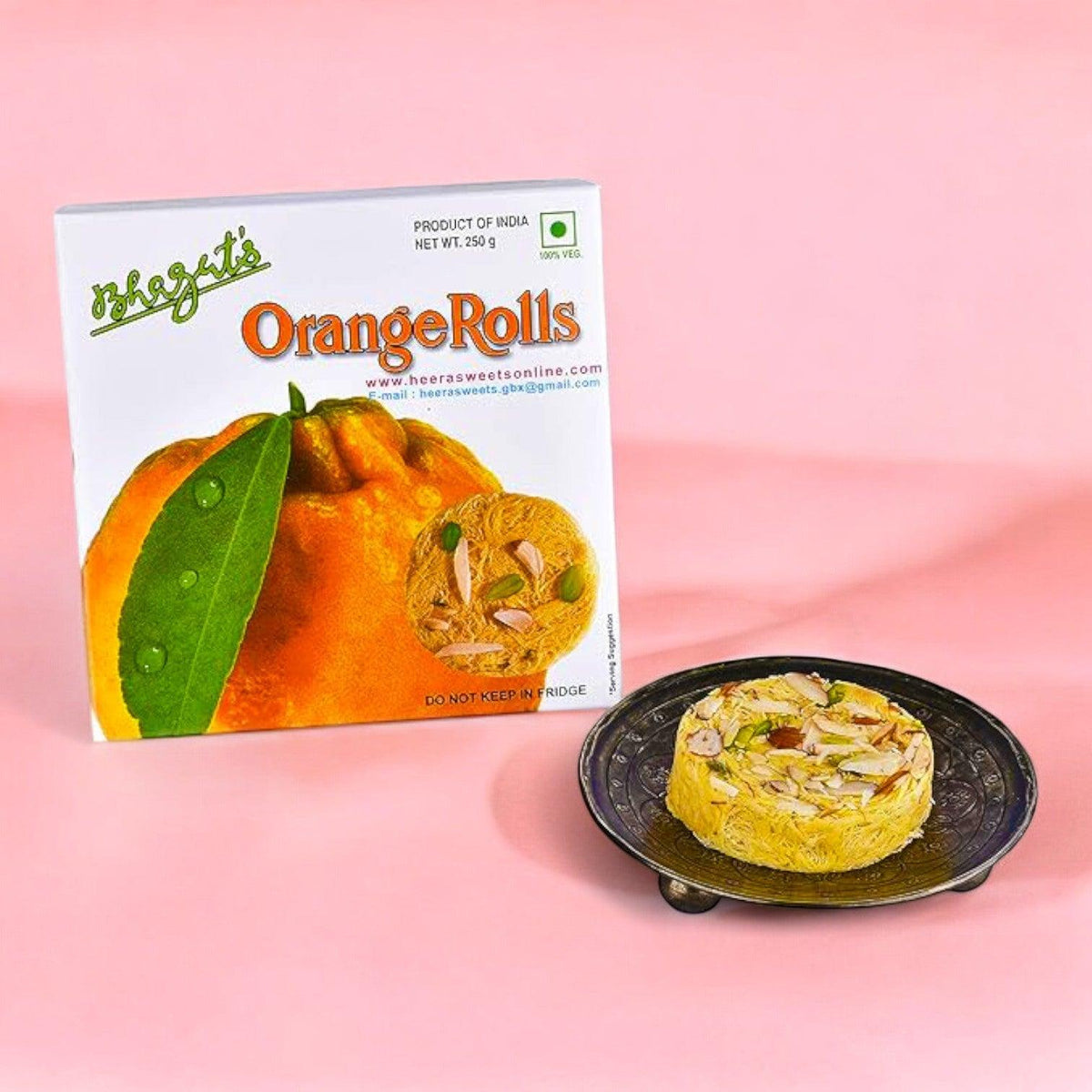    Orange Rolls - 250gm available online at SweeDesi