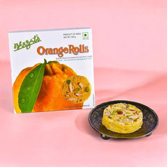    Orange Rolls - 250gm available online at SweeDesi