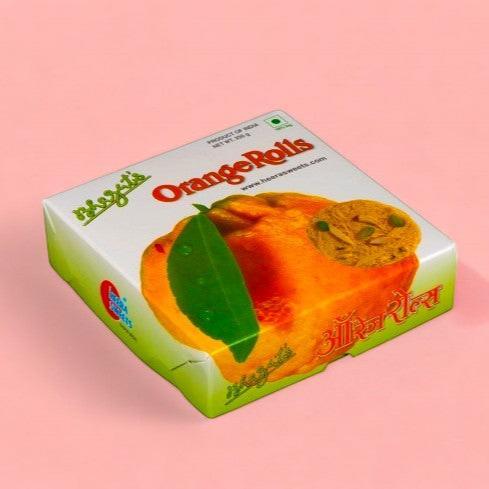    Orange Rolls - 250gm available online at SweeDesi