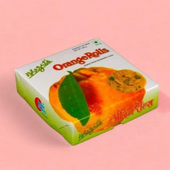    Orange Rolls - 250gm available online at SweeDesi